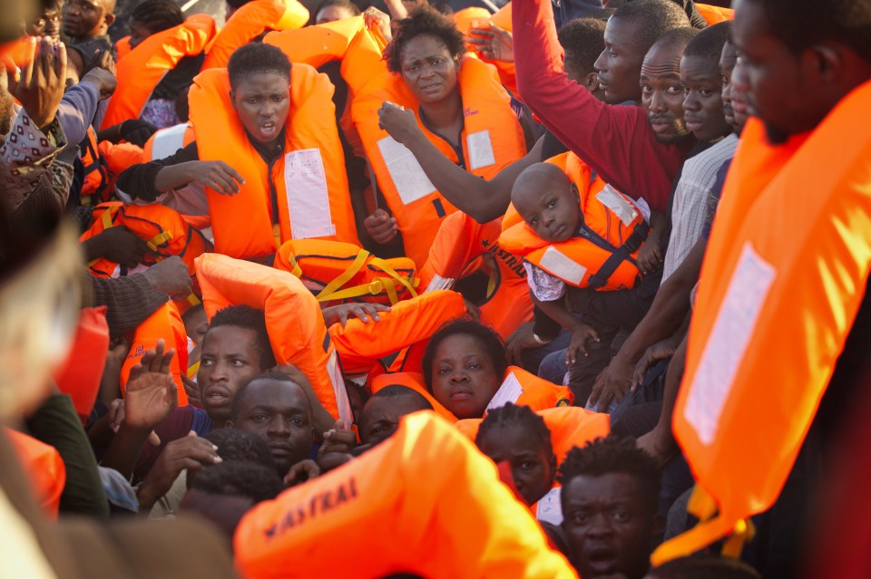Migrants from Nigeria crowd onto a dinghy fleeing Libya as news comes of another tragedy in the Med