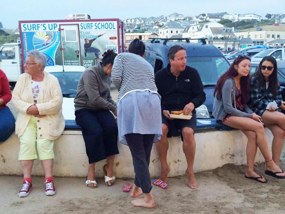 The former PM was spotted tucking into the meal at Polzeath Beach in Cornwall