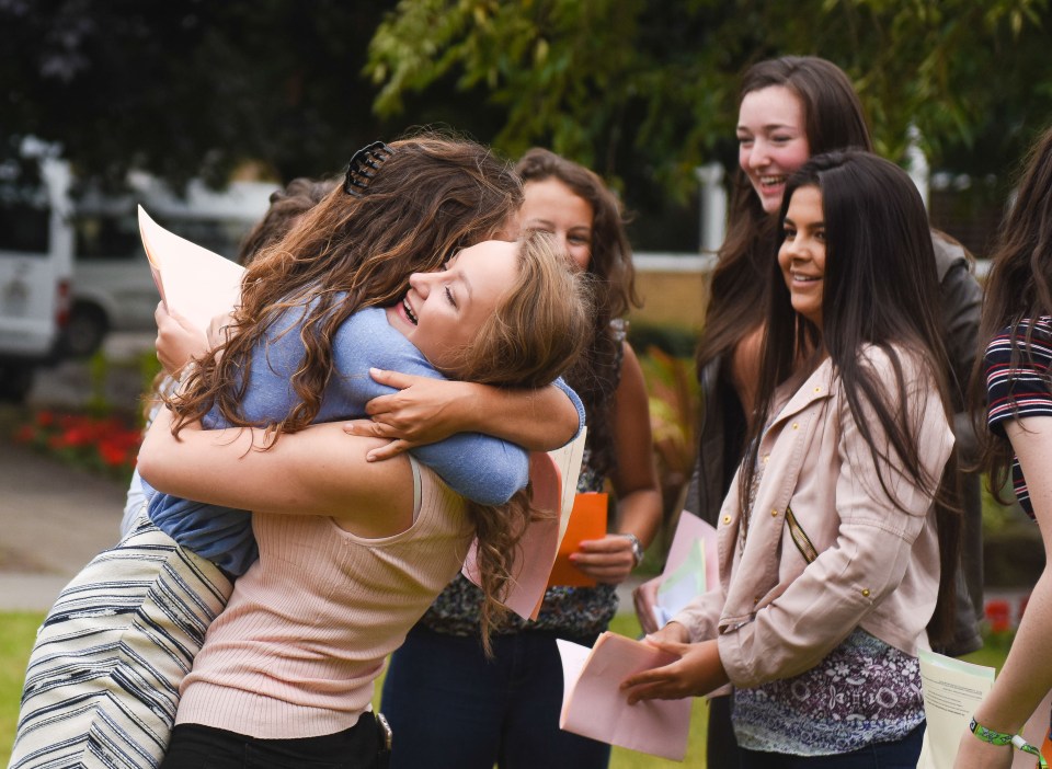 Girls at Merchant Taylor's school in Liverpool celebrate their results as 66% at the school achieve A*s or As this year