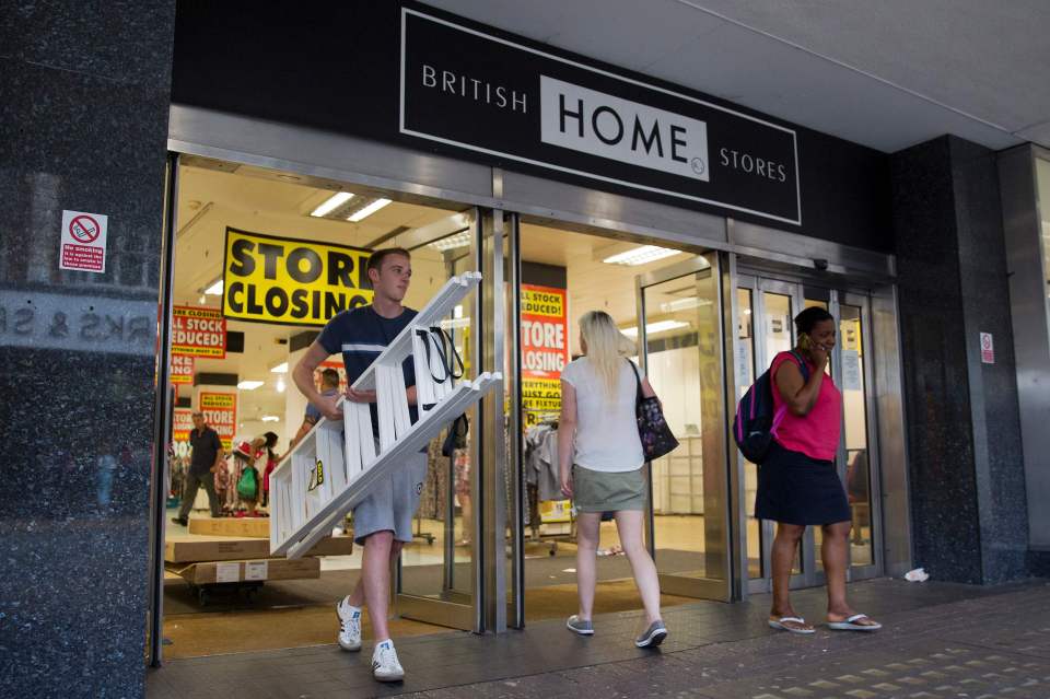 A man leaves after buying goods in the r