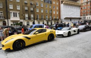 Qatari sheikh flies in fleet of Ferrari, Porsche, and Bugatti motors for London's supercar season