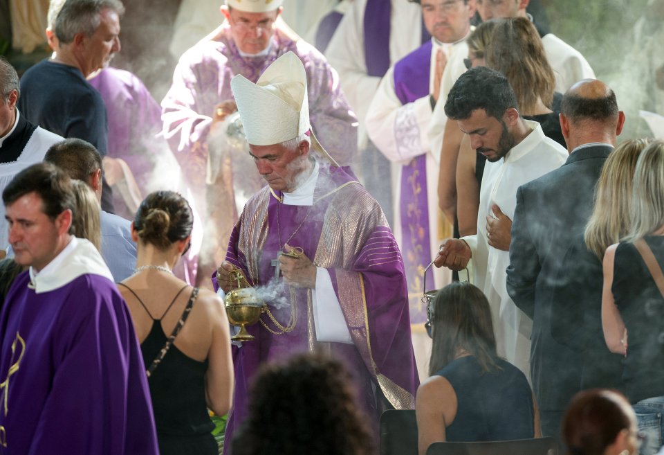 Giovanni D'Ercole, bishop of Ascoli Piceno, led the heartbreaking service