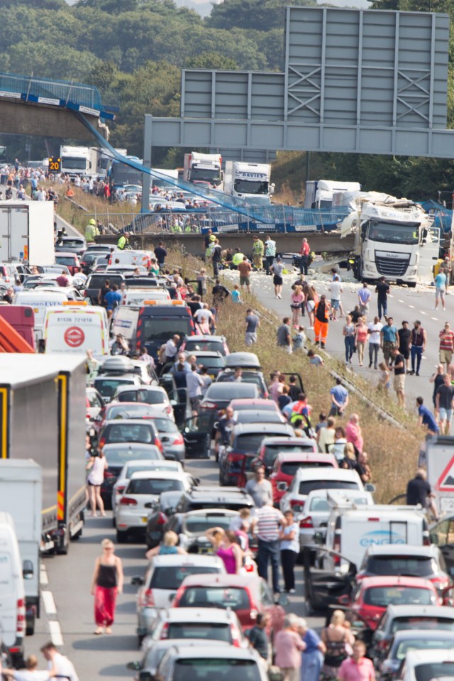Footbridge collapses onto the M20 in Kent