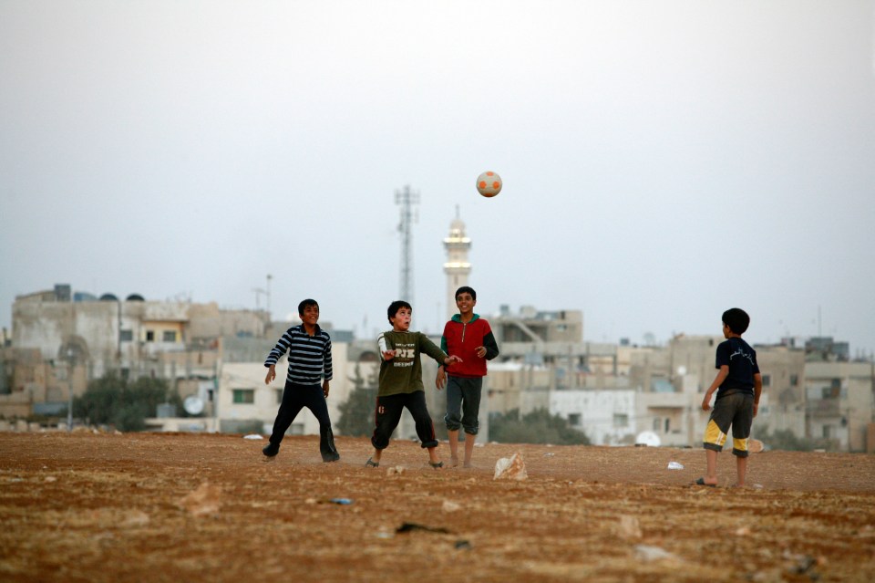 Children playing football in Madaba, Jordan.. Image shot 11/2010. Exact date unknown.