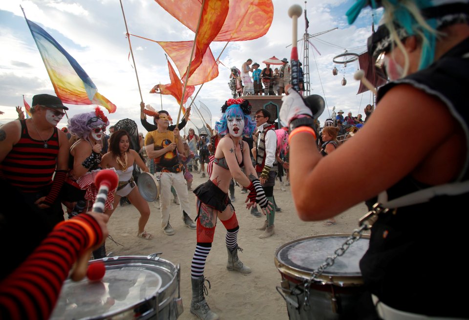 Check us out ... Members of the Trash Kan Marchink Band perform