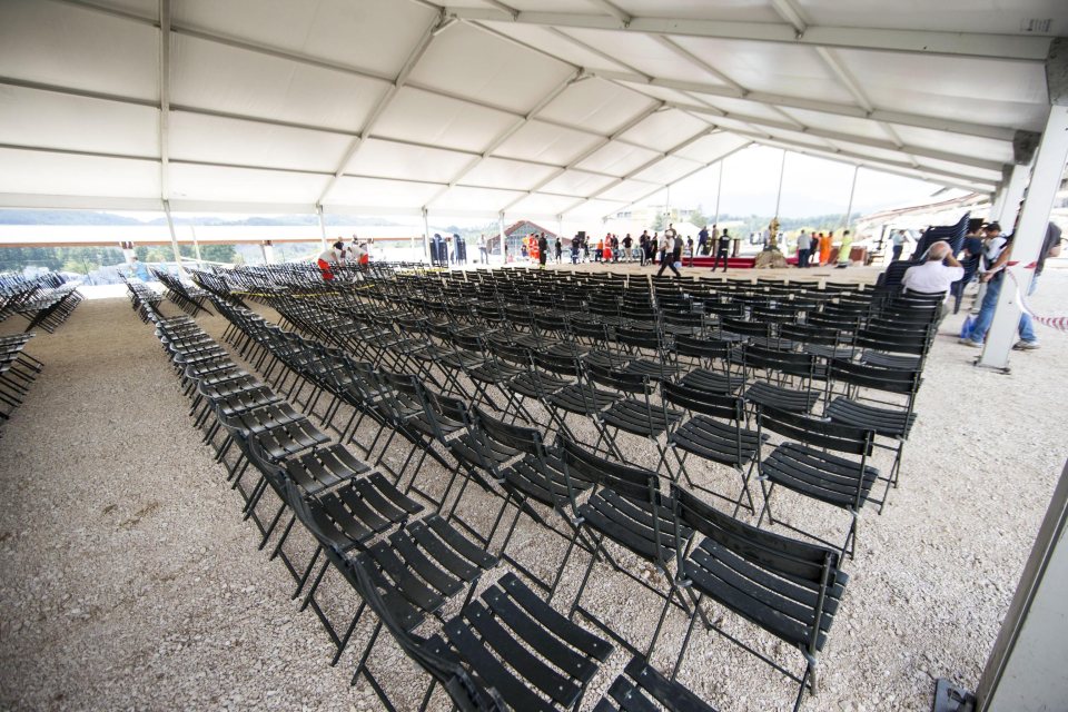 The service was held in a giant tent, hastily organised by officials in the Italian town