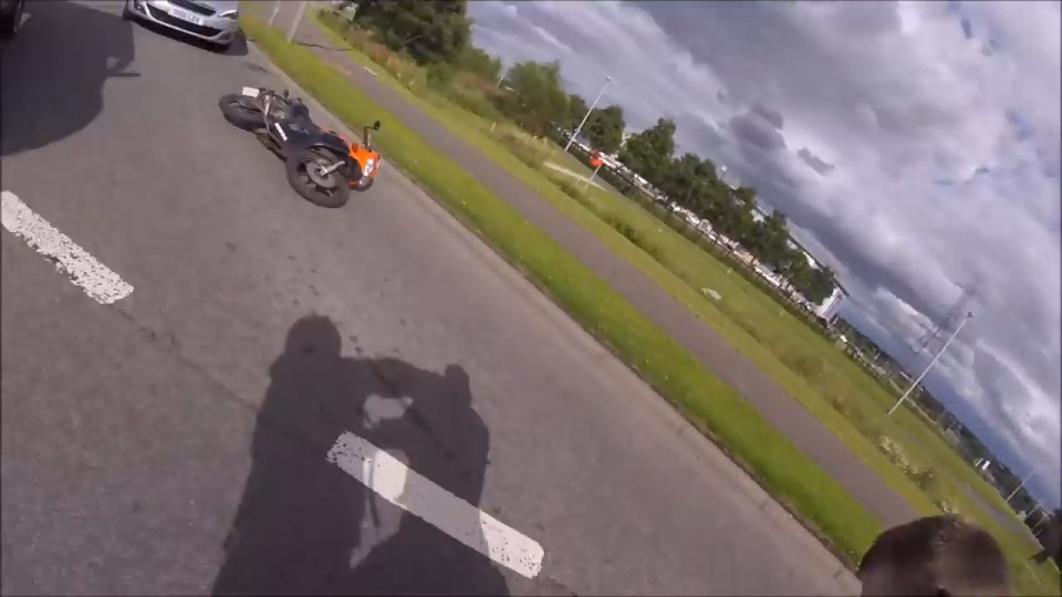 At one point the shadow of the two men grappling can be seen on the tarmac