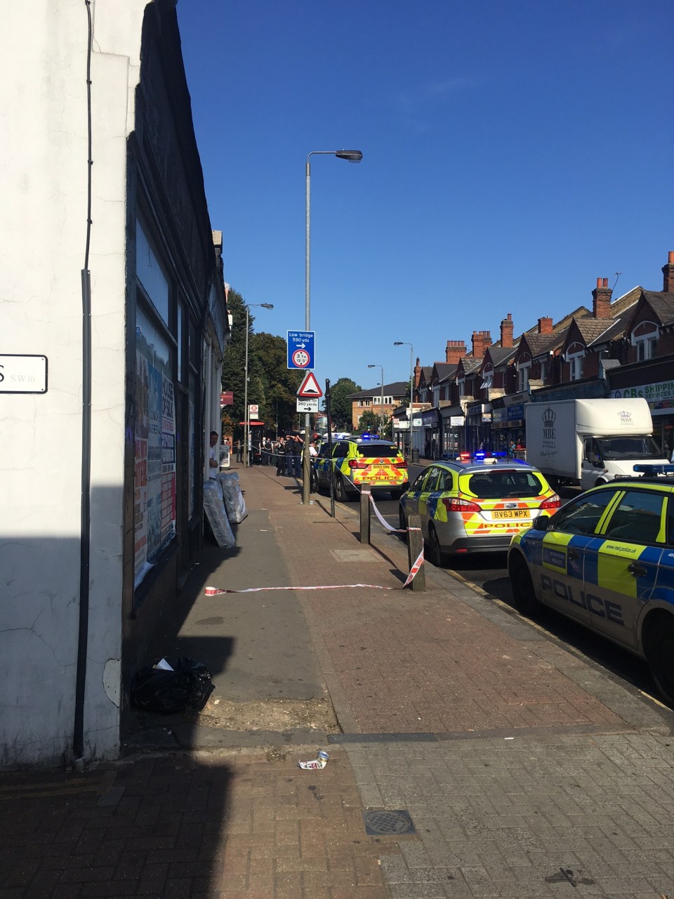 Workers in the area said police marksmen stormed Mitcham Lane in South London