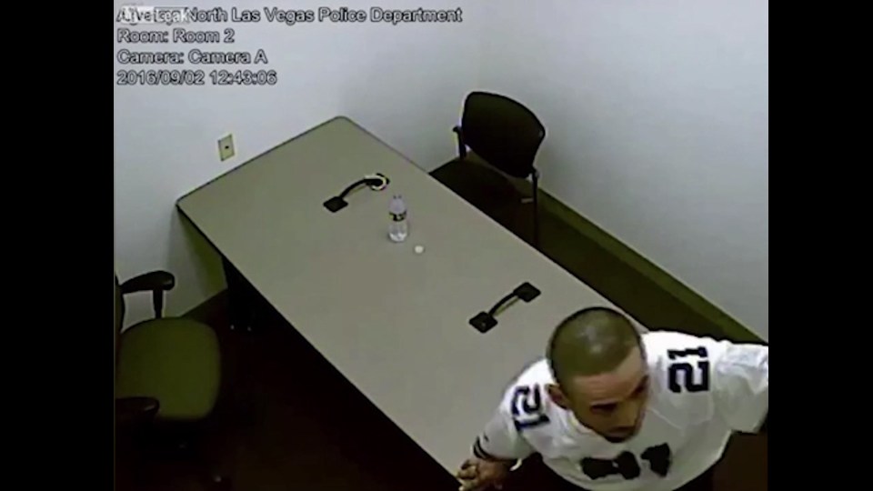 After breaking out of the cuffs, Perez heads for the corner of the room, next to the camera