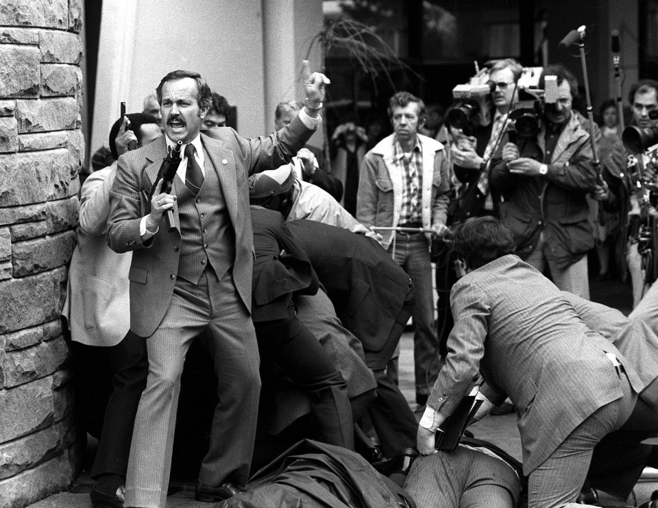 Hinckley is wrestled to the ground in this March 30, 1981