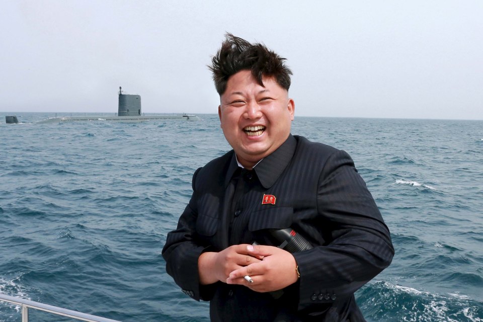 KCNA picture of North Korean leader Kim Jong Un watching the test-fire of a strategic submarine underwater ballistic missile