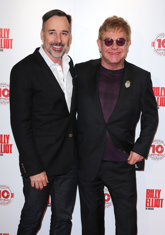 David and Elton waved goodbye to their two sons before the pair headed off to their first day back at school