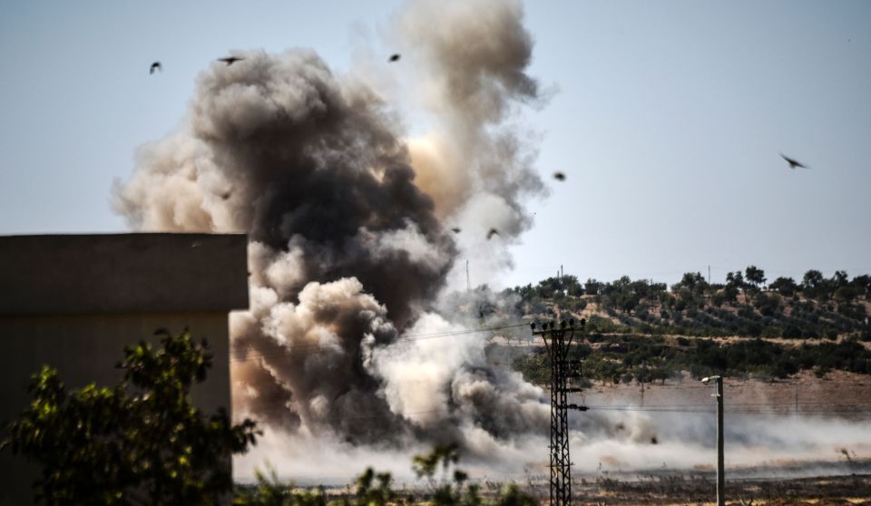 Smoke rising close to the Syrian-Turkish border town of Jarabulus