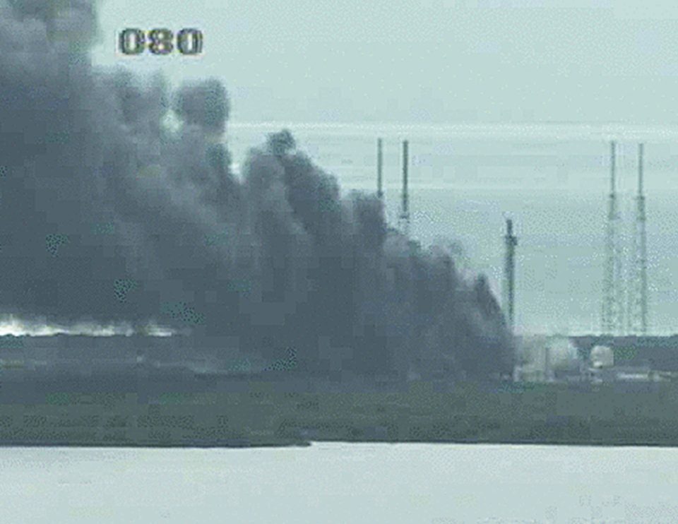 An image from the NASA live camera shows a fire raging on the launch pad at Cape Canaveral