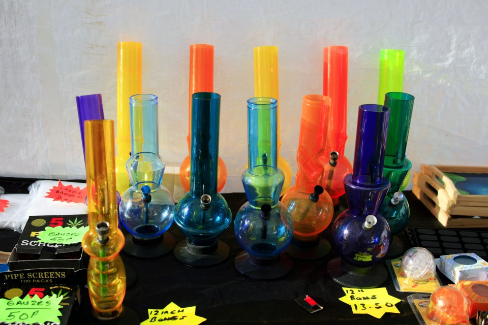 Bongs or water Pipes for sale on a market stall often used for smoking dope but legal to sell in England