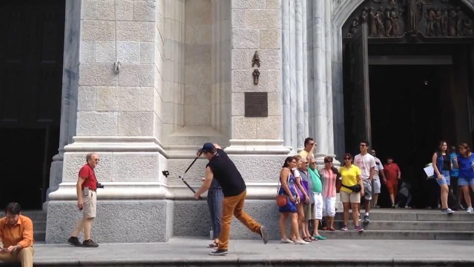 The self-proclaimed selfie stick hater ran through the streets of New York to destroy the sticks
