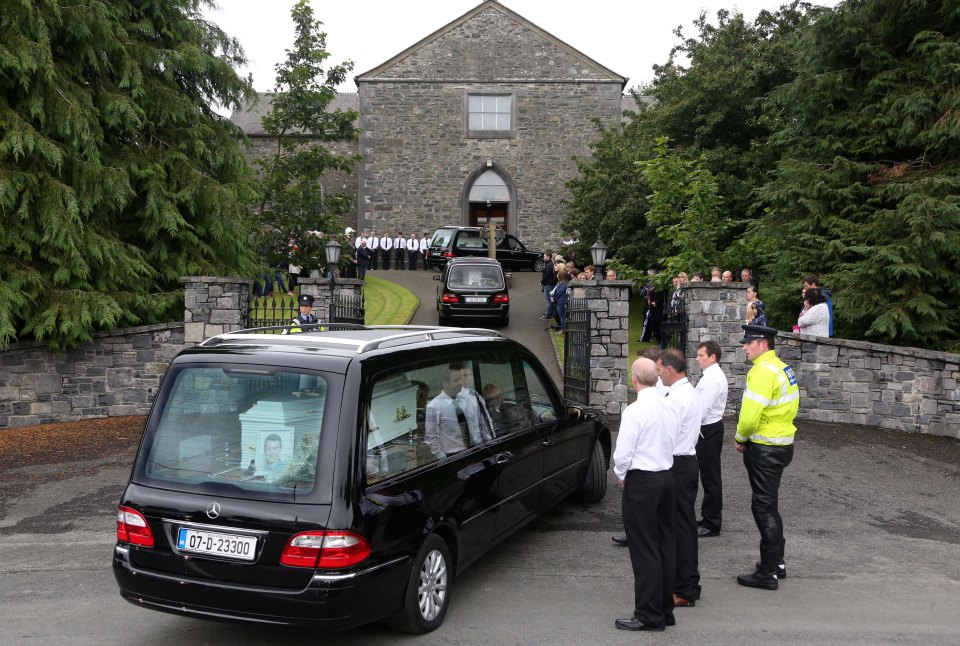 The bodies of three young boys arrive into St. Mary's Church, Castlerahan, Co. Cavan this evening for their funeral mass