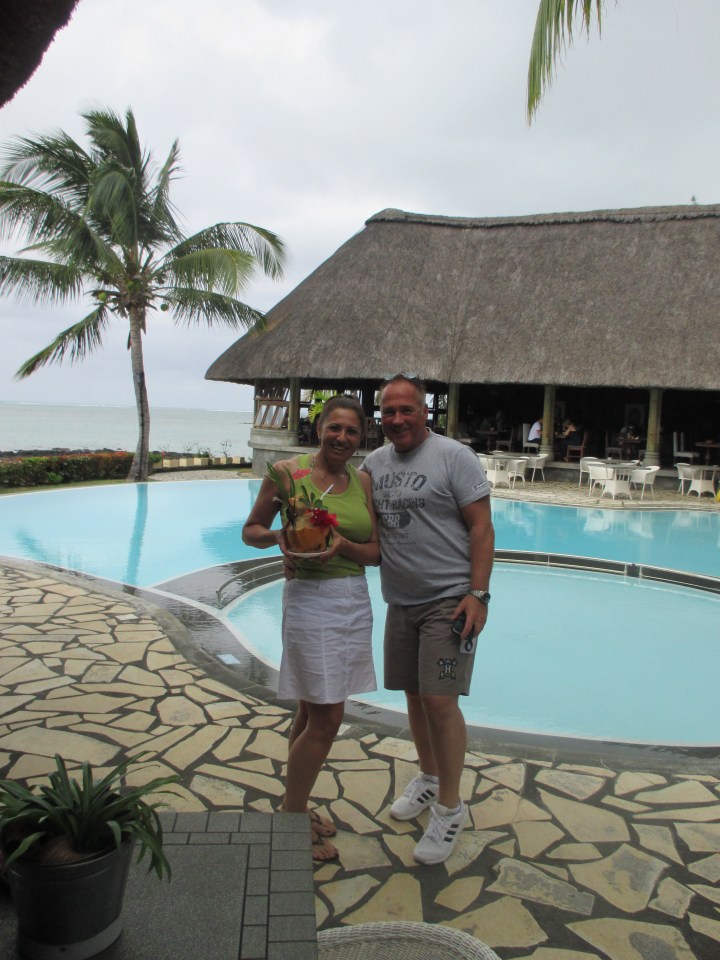 Julie and Jeff Bryne posing at their resort in Mauritius, told each other they loved each other