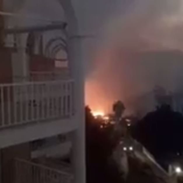 The inferno sent plumes of smoke billowing across the resort