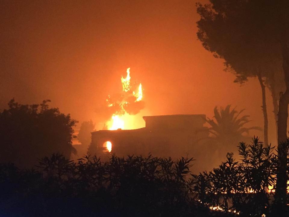 The massive forest fire illuminates the night sky in Javea