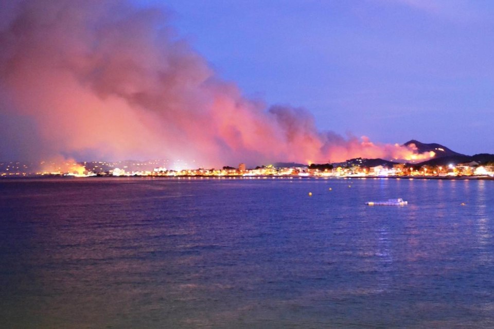 The sky turns purple due to the light caused by the raging inferno