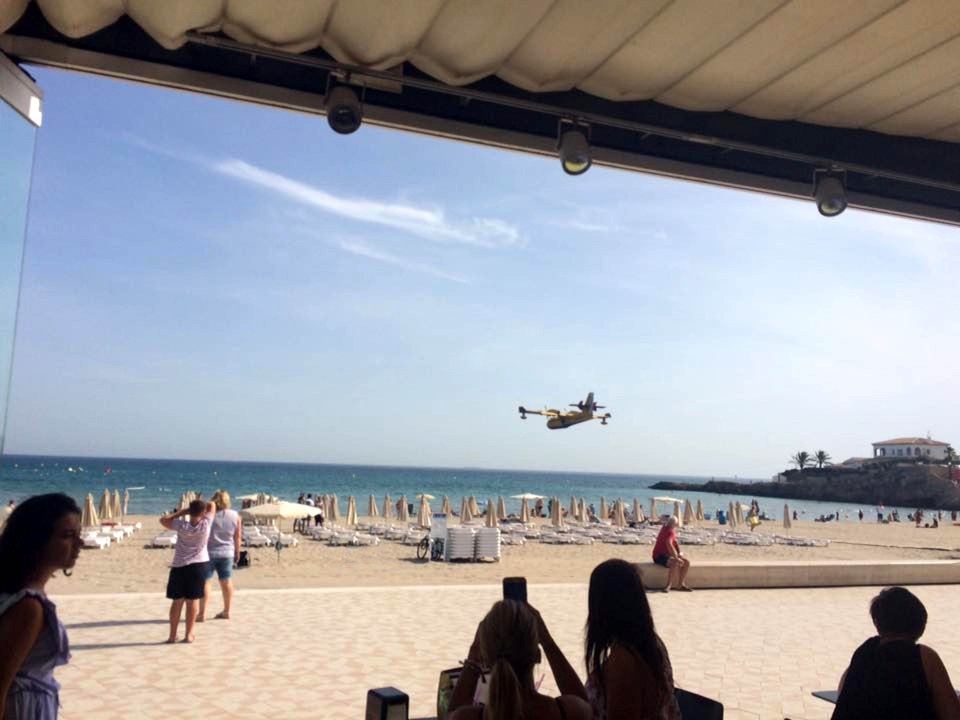 A huge forest fire is raging across the hills surrounding the Costa Blanca resort of Javea, threatening to scorch homes and forcing the evacuation of hundreds of holidaymakers.