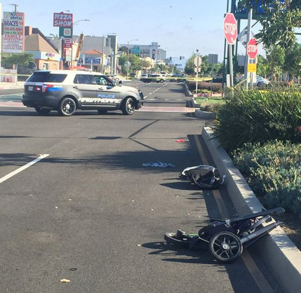 The little lads pram lay broken at the side of the road following the smash which also badly injured a 15-year-old girl