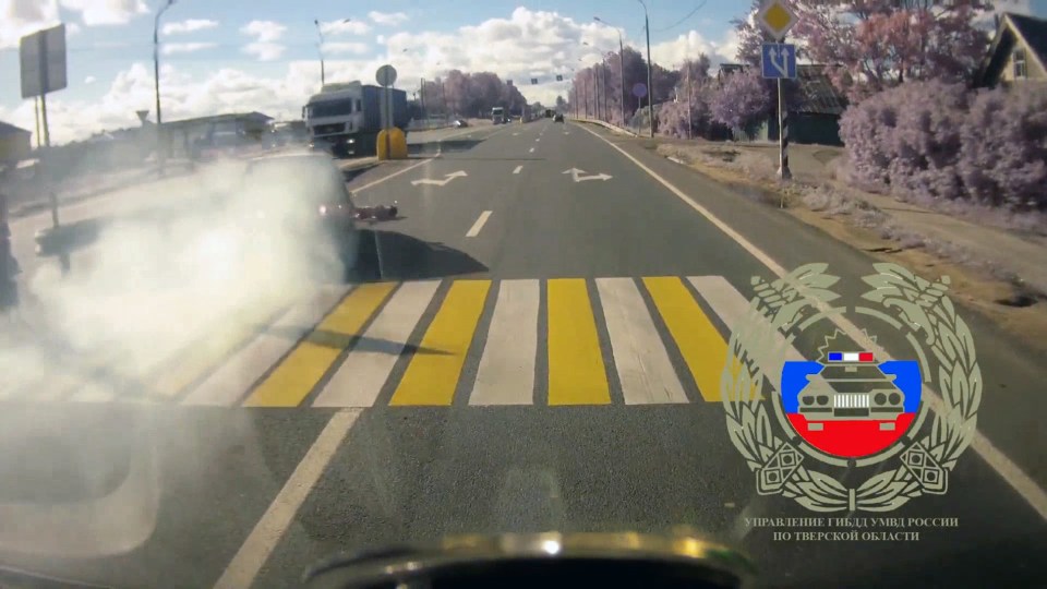 The car ploughs into both girls and sends them skidding down the road