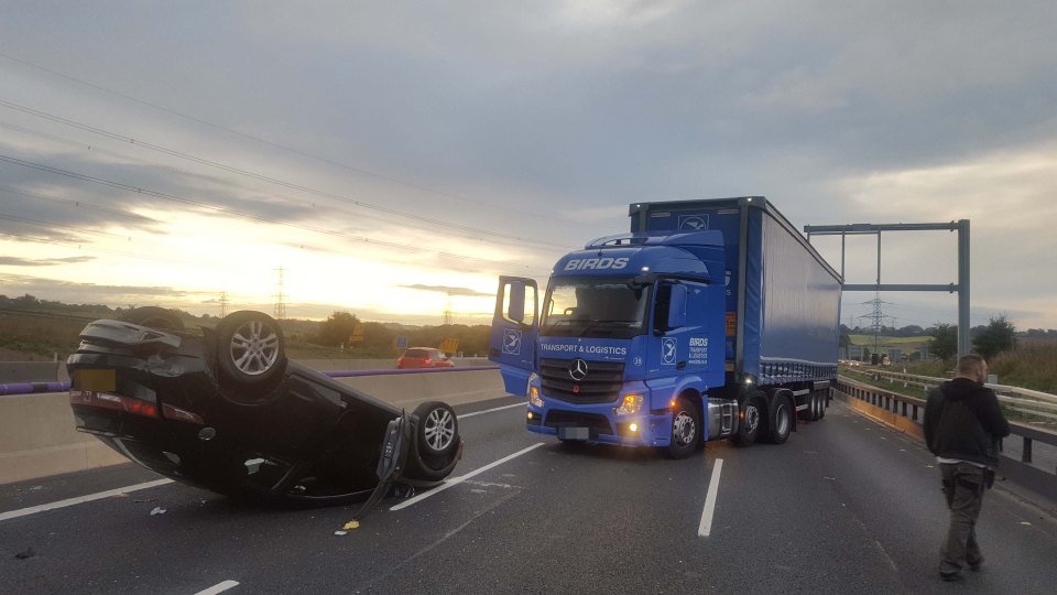 Lorry parked to help driver of flipped car infuriated motorists behind