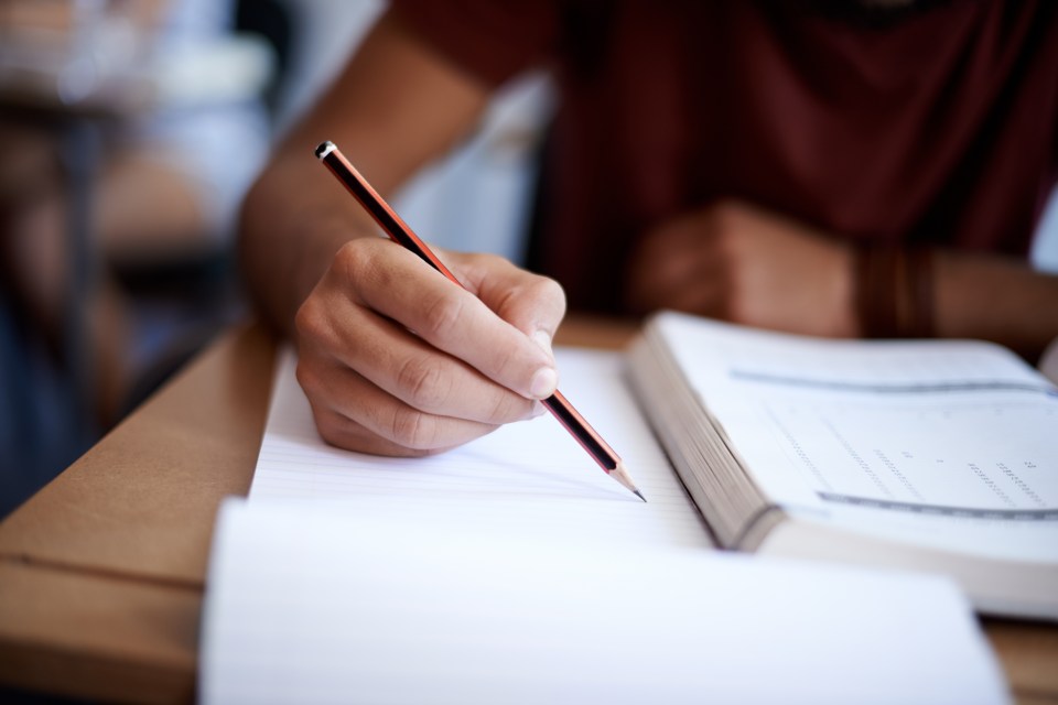 writing on a note pad