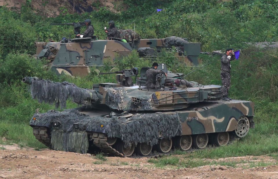 South Korean soldiers man a K1 tank on a