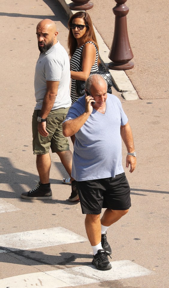 The tycoon was still snapped looking relaxed as he strolled around the posh French city