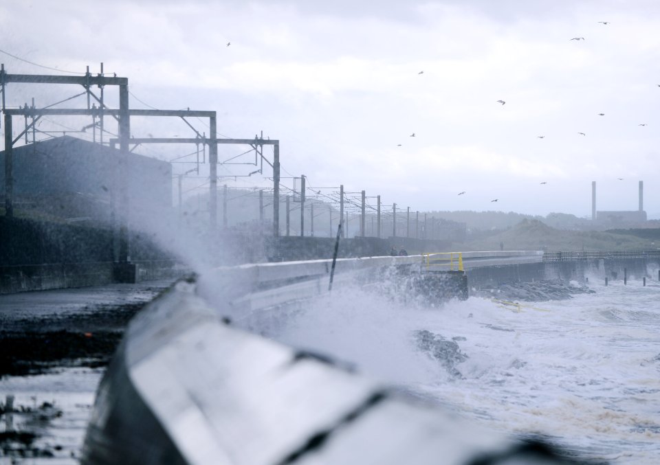Waves crash into the coast in Saltcoats, Ayrshire, with Scotland experiencing wet and windy weather, in stark contrast to the Indian summer across much of the rest of the UK