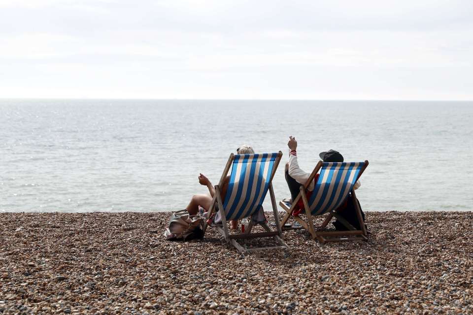 People make the most of the sunshine which is making it an unusually hot September
