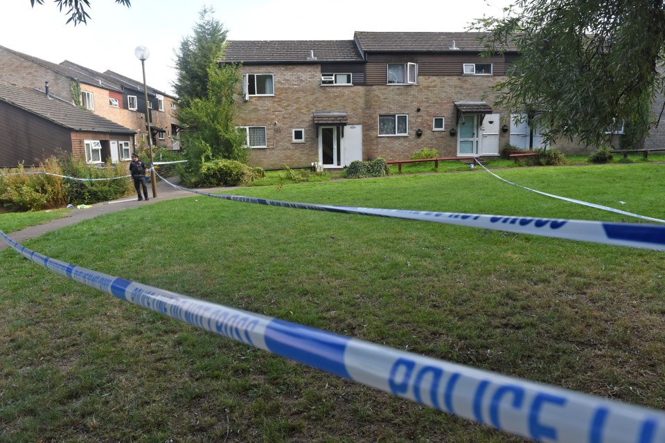 Police have cordoned off the home after a man was shot when answering the door of his Milton Keynes home