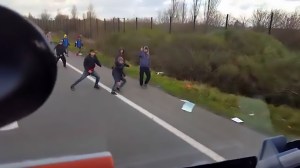 The driver is heard hurling chilling threats at the men