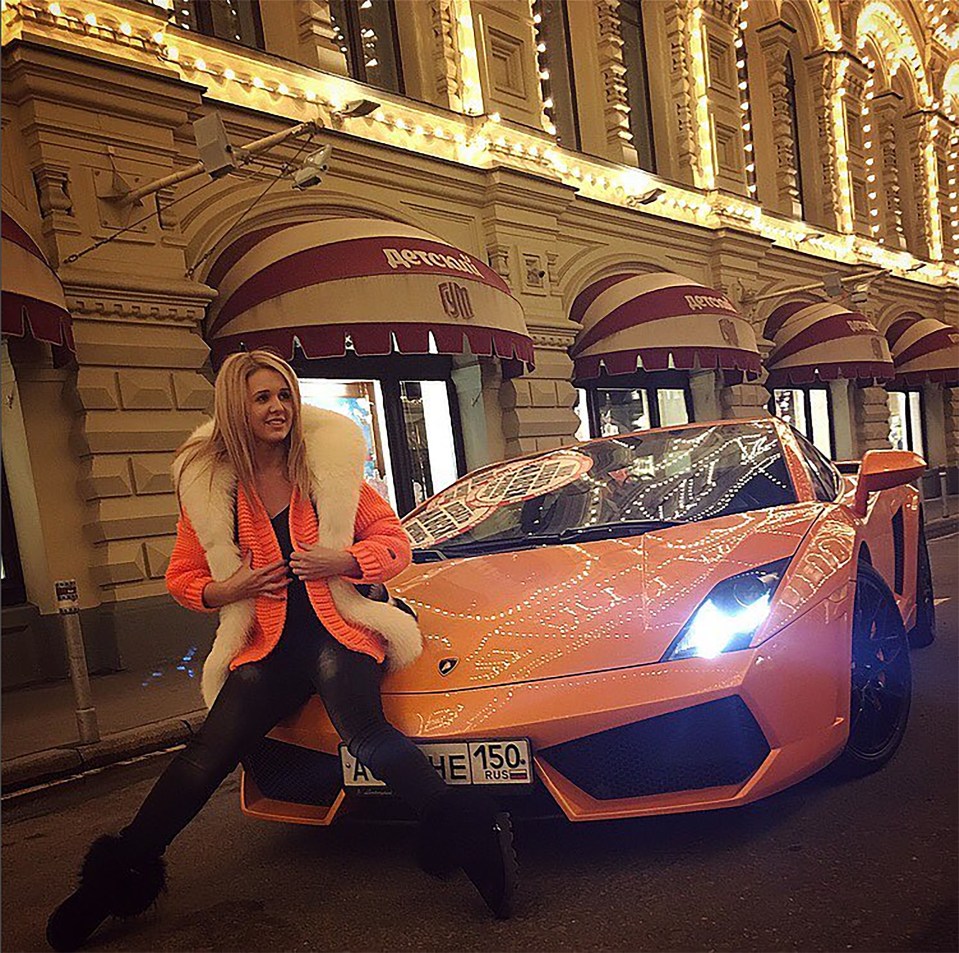 Arina Mikhaltsova posing with the Lamborghini