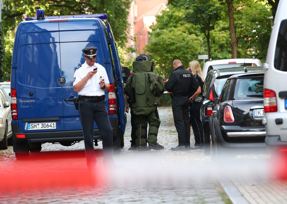 Police teams scoured the area after poison-laced marzipan sweets were discovered in a school playground