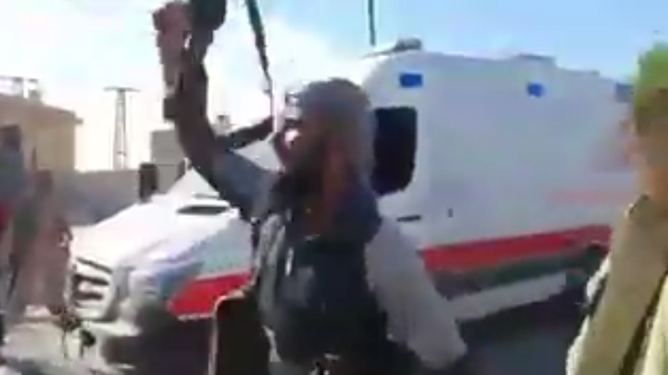 A man is seen chanting in the video