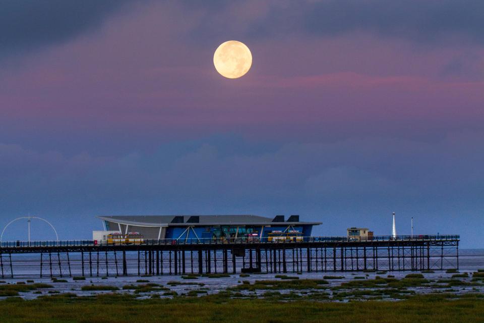 A harvest moon in the sky over Southport