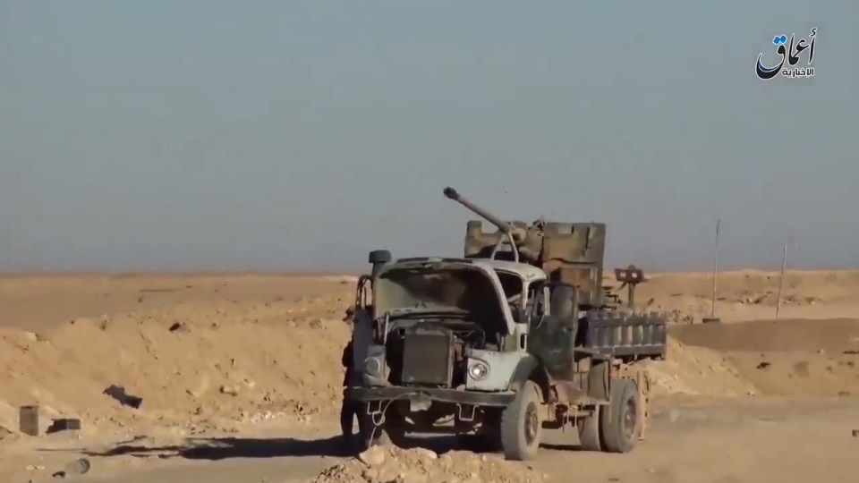 A burned out truck seen in the vile video
