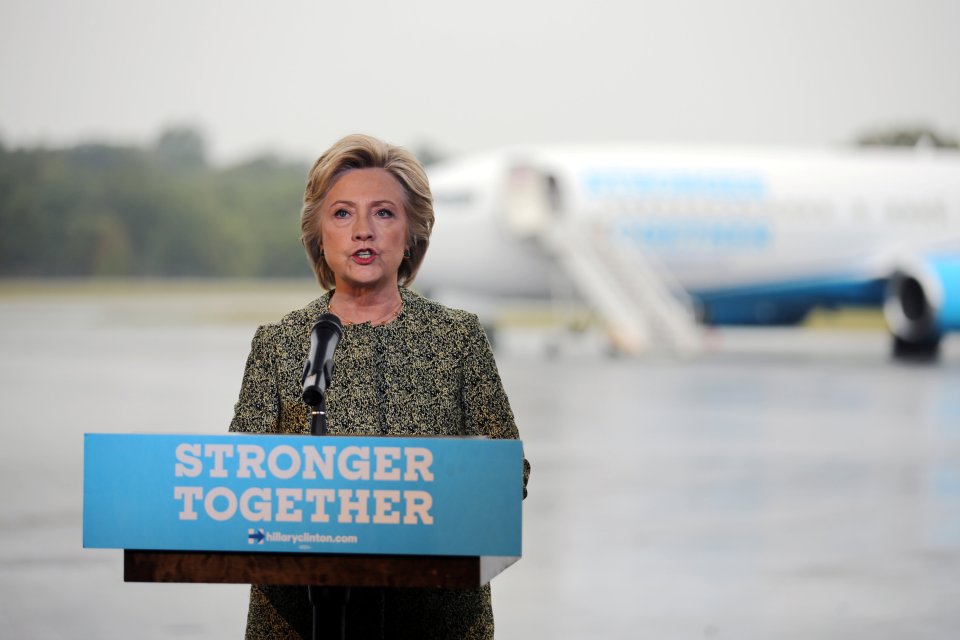 U.S. Democratic presidential candidate Hillary Clinton speaks to the media before boarding her campaign plane at the Westchester County airport in White Plains