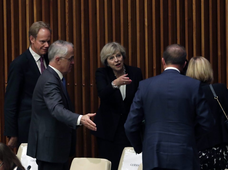 Theresa May leaves after addressing a meeting entitled the 'High-level Forum Addressing Large Movements of Refugees and Migrants' in the ECOSOC chamber at United Nations headquarters in New York