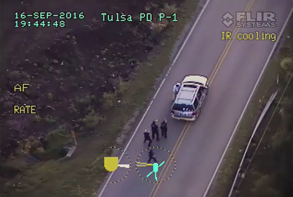 Terence Crutcher, top, is pursued by police officers as he walk to his vehicle in Tulsa