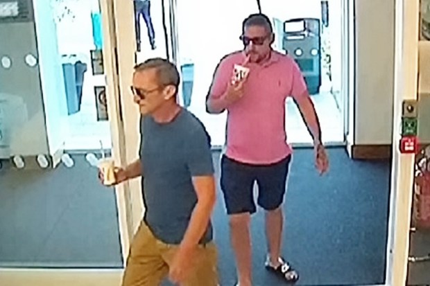 Two suspects entering the hotel