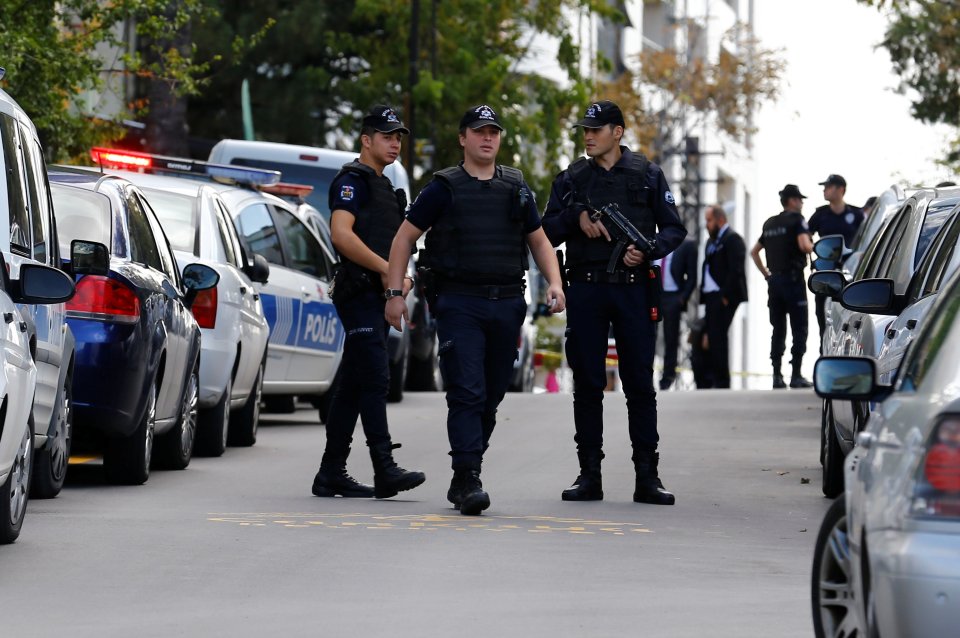 Riot police stand guard near the of Israeli Embassy in Ankara