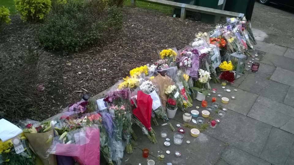 Flowers were laid out in tribute to Mr Roy after his alleged murder