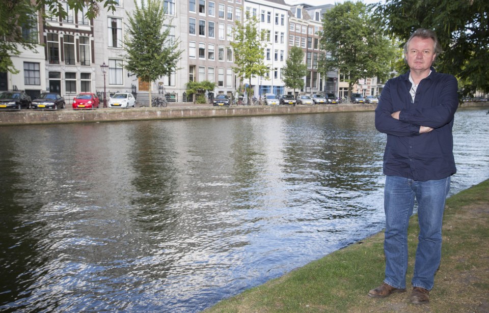 Eric Slot pictured in front of the Nieuwe Herengracht Canal