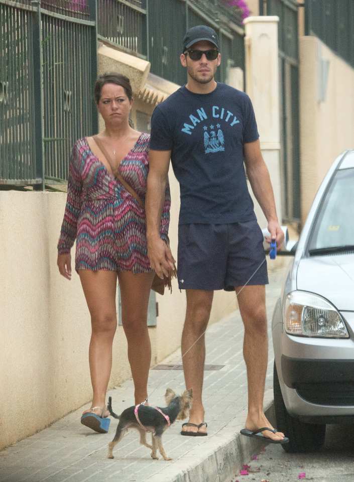 Pics show Karen Danczuk and new boyfriend "David", a local waiter leaving her apartment to walk a dog, in Algorfa, near Alicante, Spain. Karen recently had a physical bust-up with her MP husband Simon Danczuk over her closeness with the waiter.