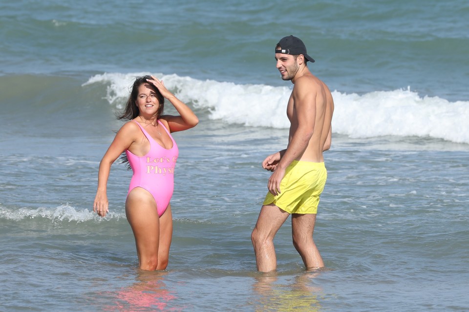 The couple certainly seemed to be living up to the 'Lets Get Physical' slogan emblazoned across Karen's swimming costume